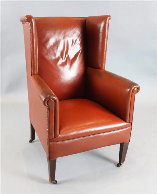 A George III mahogany wing armchair, W.2ft 2in. D.2ft 4in. H.3ft 5in.
